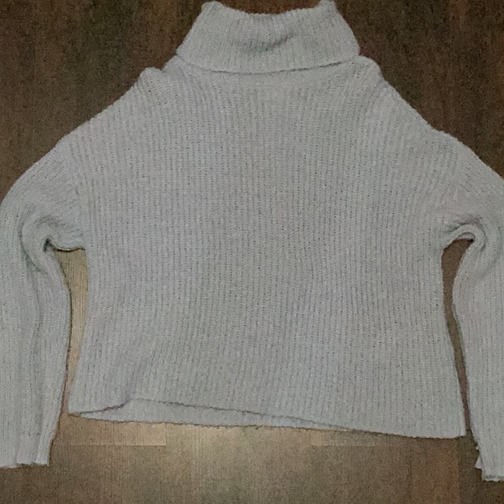 Knitted blue sweater